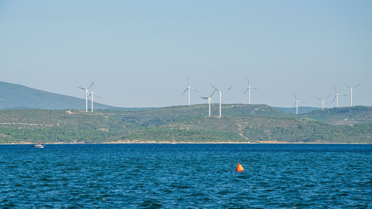 Wind turbines are seen in Sığacık, a seaside neighborhood of Seferihisar district in Izmir province, western Türkiye, Dec. 14, 2020. (Shutterstock Photo)