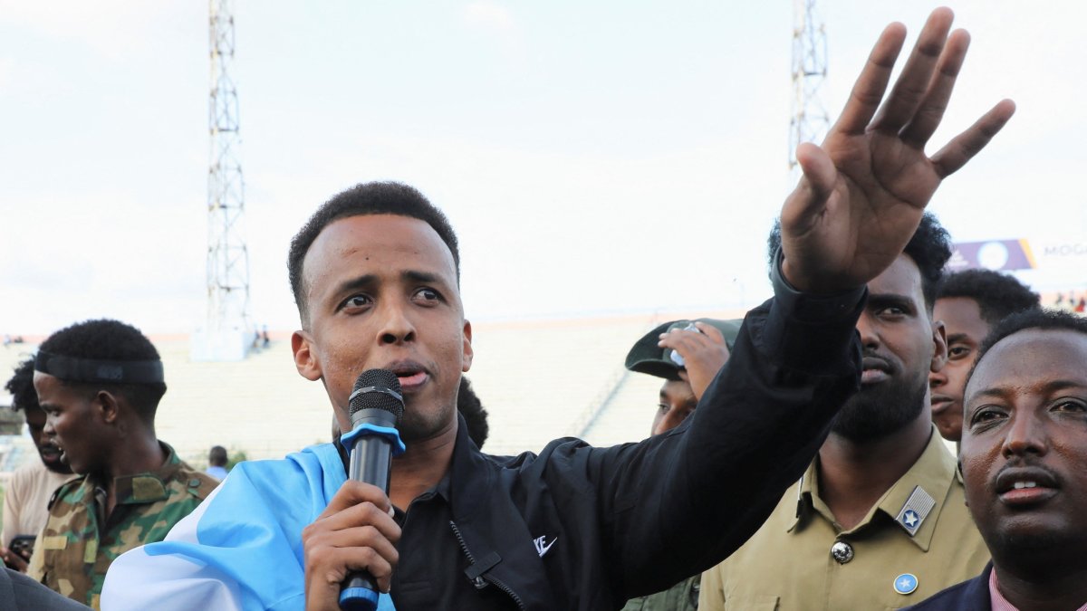 Somali referee Omar Abdulkadir Artan, who was expected to officiate at matches during the 2026 FIFA World Cup but was denied entry to U.S., addresses fans at the Mogadishu stadium, Mogadishu, Somalia, June 10, 2026. (Reuters Photo)