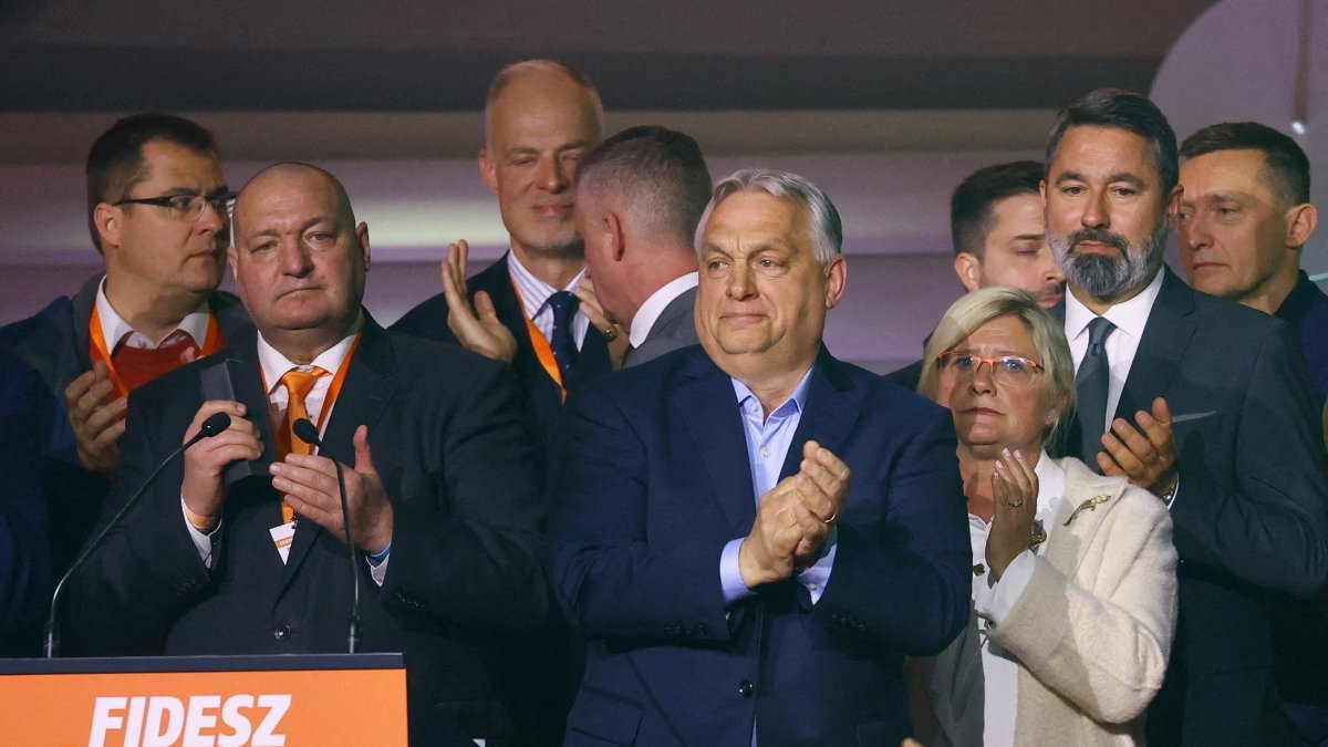 Hungarian Prime Minister Viktor Orban reacts as people applaud after the announcement of the partial results of the parliamentary election in Budapest, Hungary, April 12, 2026. (Reuters File Photo)