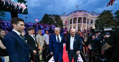 US President Donald Trump and UFC CEO Dana White arrive for the "UFC Freedom 250" mixed martial arts event on the South Lawn of the White House, Washington, U.S., June 14, 2026. (AFP Photo)