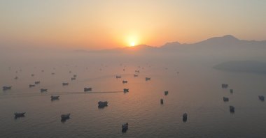 A drone view shows vessels in the Strait of Hormuz, as seen from Musandam, Oman, June 15, 2026. (Reuters Photo)