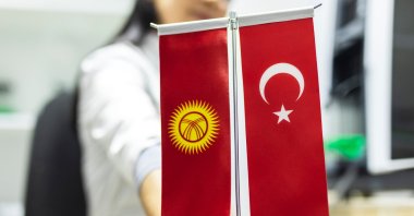The flags of Kyrgyzstan and Türkiye are displayed together, symbolizing the friendship and strong ties between the two countries. (Shutterstock Photo) 