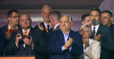Hungarian Prime Minister Viktor Orban reacts as people applaud after the announcement of the partial results of the parliamentary election in Budapest, Hungary, April 12, 2026. (Reuters File Photo)