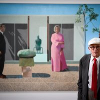 British artist David Hockney poses in front of his painting "Fred and Marcia Weisman" during a photo session at the Pompidou Centre, Paris, France, June 16, 2017. (AFP Photo)