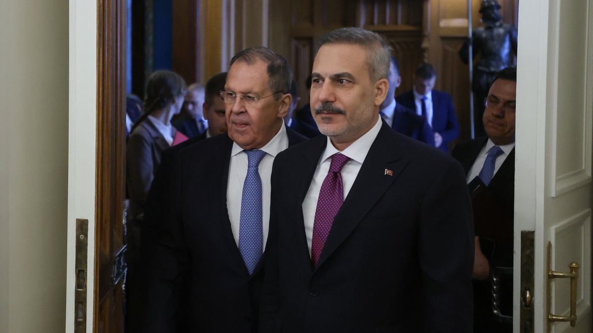 Russian Foreign Minister Sergey Lavrov (L) and Foreign Minister Hakan Fidan enter a hall during their meeting, Moscow, Russia, June 16, 2026. (EPA Photo)