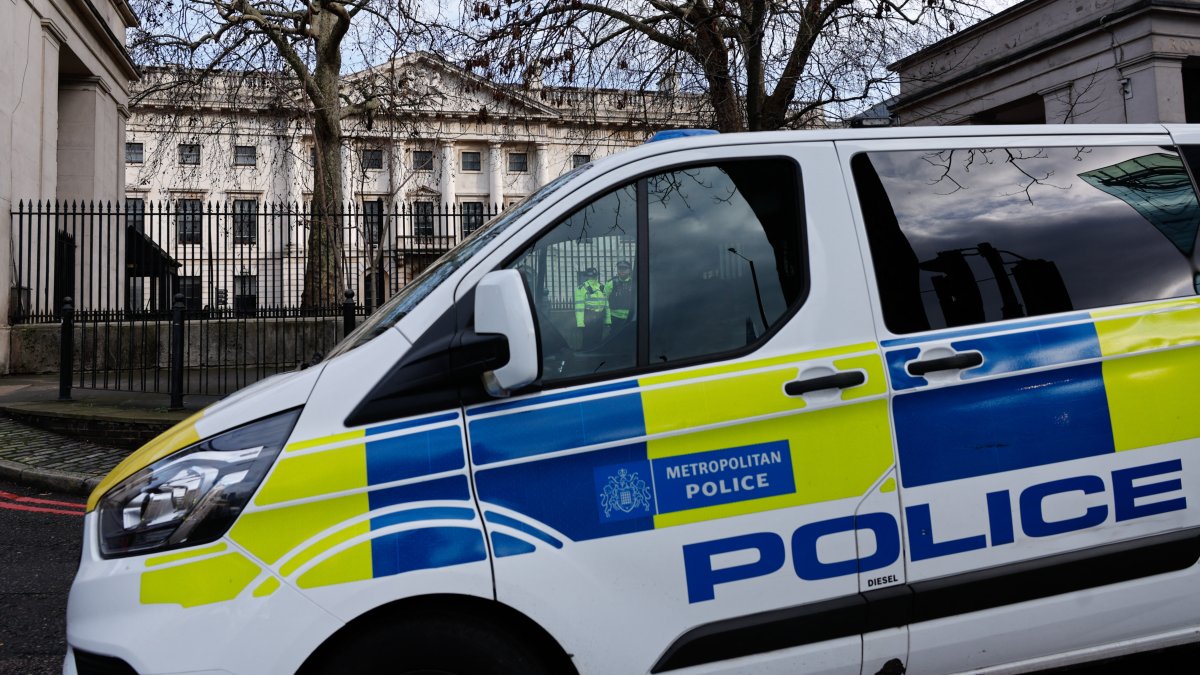 A police vehicle sits outside Royal Mint Court, in London, England, Jan. 17, 2026. (AFP File Photo)
