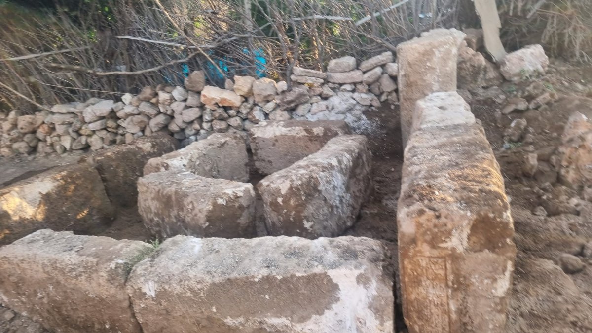 Ancient stone tablets bearing inscriptions uncovered during landscaping work in the Midyat district, Mardin, Türkiye, June 16, 2026. (DHA Photo)