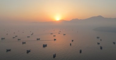 A drone view shows vessels in the Strait of Hormuz, as seen from Musandam, Oman, June 15, 2026. (Reuters File Photo)