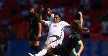 England's Jude Bellingham (L) is challenged by Croatia's Luka Modric during the UEFA Euro 2020 Championship Group D match between England and Croatia at Wembley Stadium, London, U.K., June 13, 2021. (Getty Images Photo)