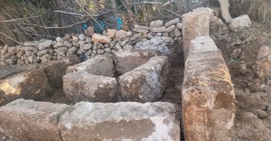 Ancient stone tablets bearing inscriptions uncovered during landscaping work in the Midyat district, Mardin, Türkiye, June 16, 2026. (DHA Photo)