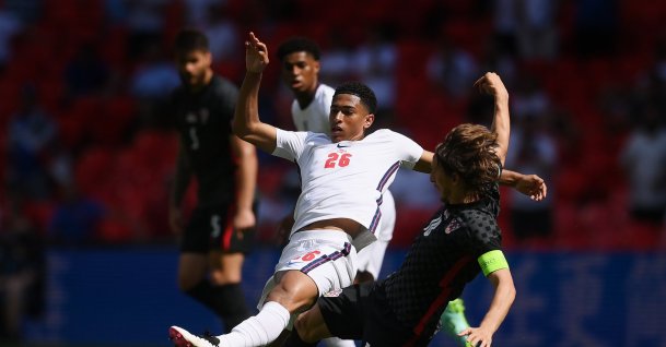 England's Jude Bellingham (L) is challenged by Croatia's Luka Modric during the UEFA Euro 2020 Championship Group D match between England and Croatia at Wembley Stadium, London, U.K., June 13, 2021. (Getty Images Photo)