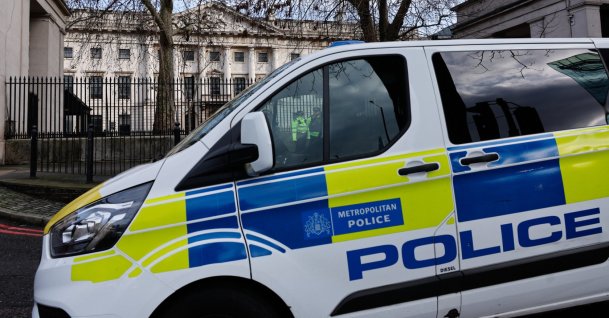 A police vehicle sits outside Royal Mint Court, in London, England, Jan. 17, 2026. (AFP File Photo)