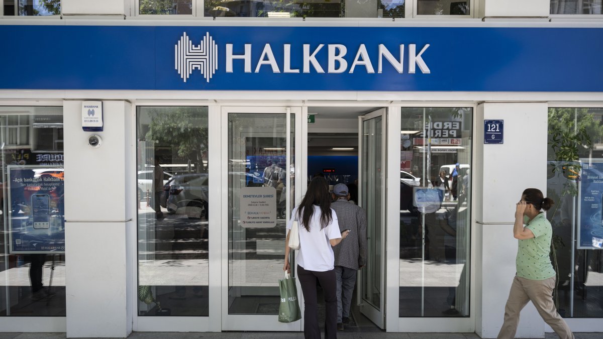 People are seen entering a Halkbank branch, Ankara, Türkiye, June 15, 2026. (AA Photo)