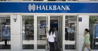 People are seen entering a Halkbank branch, Ankara, Türkiye, June 15, 2026. (AA Photo)
