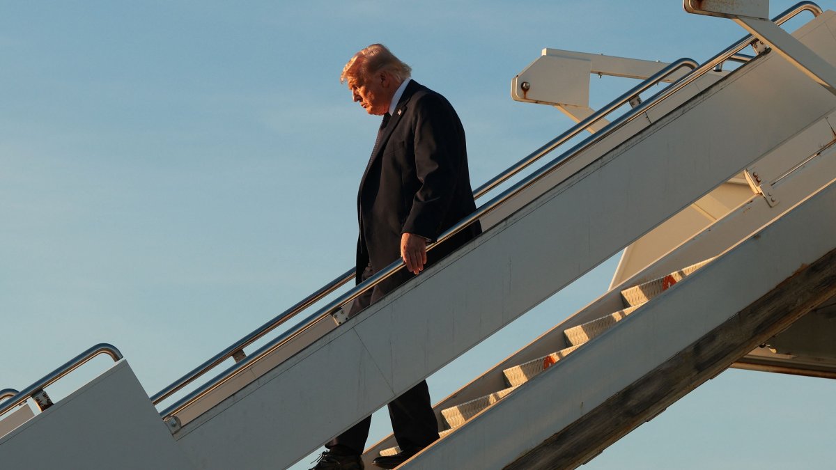U.S. President Donald Trump departs Air Force One as he arrives at Orly Airport to attend a dinner with French President Emmanuel Macron at Chateau de Versailles, Orly, France, June 17, 2026. (AFP Photo)