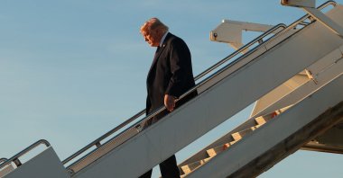 U.S. President Donald Trump departs Air Force One as he arrives at Orly Airport to attend a dinner with French President Emmanuel Macron at Chateau de Versailles, Orly, France, June 17, 2026. (AFP Photo)