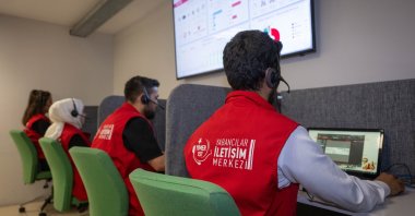 Staff at YIMER 157 Foreigners Communication Center assist callers through multiple communication channels, Ankara, Türkiye, Aug. 19, 2025. (AA Photo)