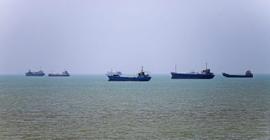 In this picture obtained from Iran's ISNA news agency, vessels are seen anchored in Bandar Abbas along the Strait of Hormuz, June 18, 2026. (AFP Photo)