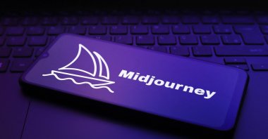 The Midjourney logo appears on the screen of a smartphone in Reno, United States, Dec. 2, 2024. (AFP File Photo)
