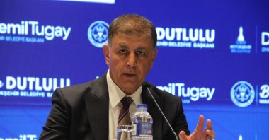 Izmir Metropolitan Mayor Cemil Tugay speaks at a conference in Manisa, June 4, 2026. (IHA File Photo)