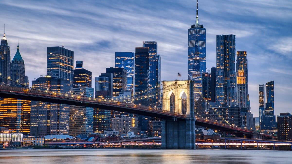 A view of Lower Manhattan and the Brooklyn Bridge at dusk, New York City, U.S. (Shutterstock Photo)