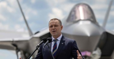 Poland's President Karol Nawrocki speaks during the ceremony for official entry into service with the Polish Air Force of the first three U.S.-made F-35 aircraft, in Lask, central Poland, June 12, 2026. (AFP Photo)