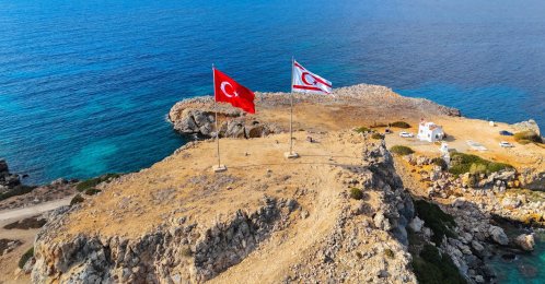 An aerial drone view shows the Turkish Republic of Northern Cyprus (TRNC) and Turkish flags flying on the Karpaz Peninsula, TRNC, Sept. 1, 2025. (Shutterstock Photo)