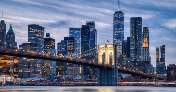 A view of Lower Manhattan and the Brooklyn Bridge at dusk, New York City, U.S. (Shutterstock Photo)