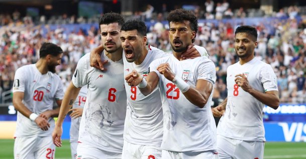 Iran's Ramin Rezaeian celebrates scoring their first goal with Mehdi Taremi and Saeid Ezatolahi during the 2026 FIFA World Cup Group G match against New Zealand at Los Angeles Stadium, Inglewood, U.S., June 15, 2026. (Reuters Photo)