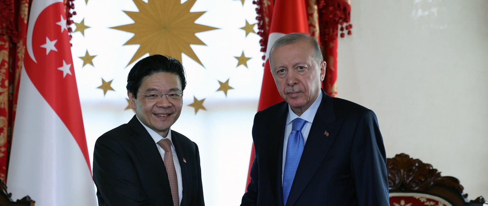 President Recep Tayyip Erdoğan and Singapore's Prime Minister Lawrence Wong shake hands as they meet at the Dolmabahçe Office in Istanbul, June 19, 2026. (AA Photo)