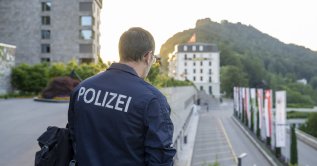 A Swiss police officer looks on at the Buergenstock resort in Obbuergen, Switzerland, June 21, 2026. (EPA Photo)