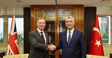 U.K. Minister of State for Trade Chris Bryant (L) and Trade Minister Ömer Bolat shake hands during a meeting, Ankara, Türkiye, June 17, 2026. (AA Photo)