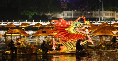 Bamboo rafts forming a golden dragon sail along the Great Canal during the Dragon Boat Festival in the Tongzhou district of Beijing, China, June 19, 2026. (EPA Photo)