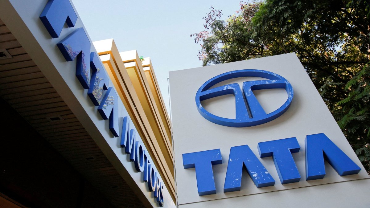  Tata Motors logos are pictured outside their flagship showroom in Mumbai, May 28, 2013. (Reuters File Photo)