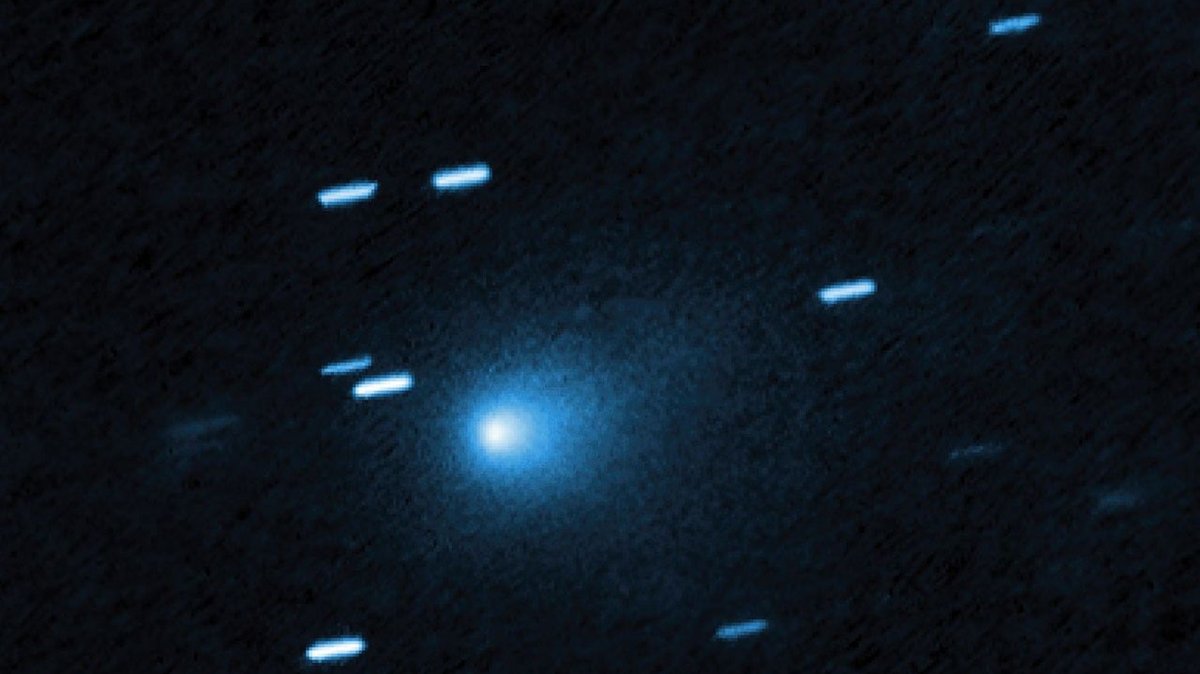 This handout photograph, released by NASA on June 22, 2026, shows a view taken by Hubble of the interstellar comet 3I/ATLAS on July 21, 2025, when the comet was 277 million miles from Earth. (Photo by Handout / various sources / via AFP) 