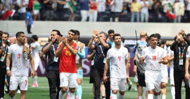 Players of Iran applaud their supporters after a draw in the 2026 FIFA World Cup group stage match, Belgium against Iran, Los Angeles, U.S., June 21, 2026. (EPA Photo)