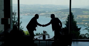 Delegation staff members meet in the lobby on the day of a quadrilateral meeting between the U.S., Iran, Pakistan and Qatar at the Lake Lucerne Summit, aimed at advancing a deal to end the Middle East conflict, at the Buergenstock Resort, Obbuergen, near Lucerne, Switzerland, June 21, 2026. (Reuters Photo)