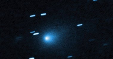 This handout photograph, released by NASA on June 22, 2026, shows a view taken by Hubble of the interstellar comet 3I/ATLAS on July 21, 2025, when the comet was 277 million miles from Earth. (Photo by Handout / various sources / via AFP) 