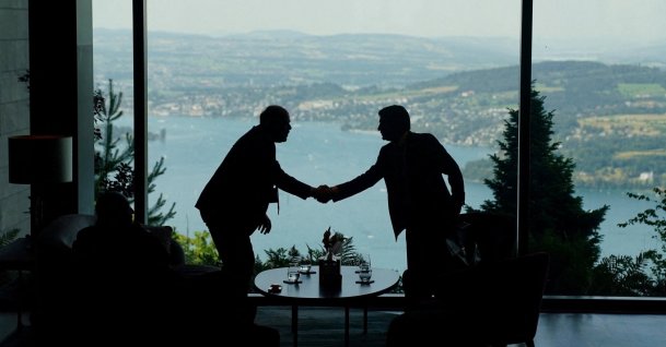 Delegation staff members meet in the lobby on the day of a quadrilateral meeting between the U.S., Iran, Pakistan and Qatar at the Lake Lucerne Summit, aimed at advancing a deal to end the Middle East conflict, at the Buergenstock Resort, Obbuergen, near Lucerne, Switzerland, June 21, 2026. (Reuters Photo)