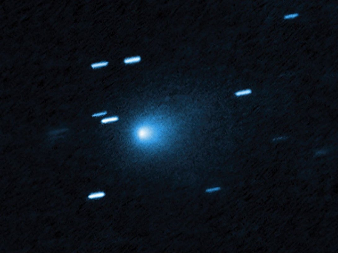This handout photograph, released by NASA on June 22, 2026, shows a view taken by Hubble of the interstellar comet 3I/ATLAS on July 21, 2025, when the comet was 277 million miles from Earth. (Photo by Handout / various sources / via AFP) 