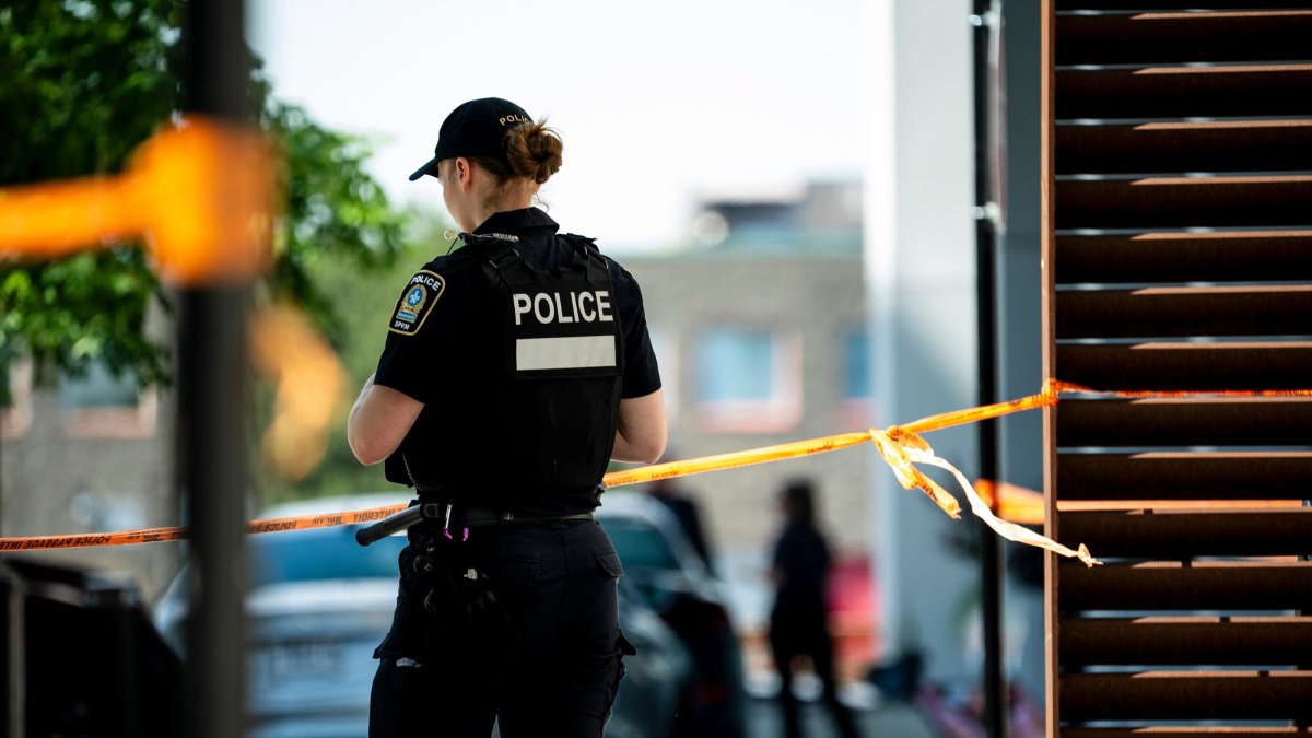 Montreal police work the scene of a shooting the day before, in Montreal, Tuesday, June 23, 2026. (AP Photo)