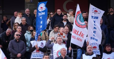 Employees of CHP-run municipality stage protest over unpaid compensation outside the municipality building, in Buca, Izmir, western Türkiye, April 9, 2026. (AA Photo)