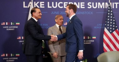 U.S. Vice President JD Vance shakes hands with Pakistan's Chief of Army Staff Field Marshal Asim Munir, next to Pakistan's Prime Minister Shehbaz Sharif, as they meet for high-level talks aimed at advancing a deal to end the Middle East conflict, at the Buergenstock Resort Lake Lucerne, near Stansstad, Switzerland, June 21, 2026. (Reuters Photo)