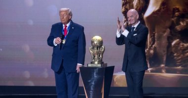 U.S. President Donald Trump receives the FIFA Peace Prize from FIFA President Gianni Infantino at the FIFA World Cup 2026 Official Draw at the John F. Kennedy Center for the Performing Arts, Dec. 05, 2025. (AFP File Photo)