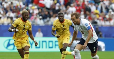 Ghana's Kwasi Sibo (L) in action against England's Harry Kane (R) during the 2026 FIFA World Cup group stage match, Boston, U.S., June 23, 2026. (EPA Photo)