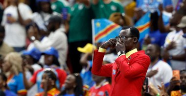 Democratic Republic of Congo's supporter Michel Kuka Mboladinga pays tribute to Democratic Republic of Congo's late prime minister Patrice Lumumba by remaining motionless ahead of the 2026 World Cup Group K football match between Colombia and DRC at the Guadalajara Stadium, Zapopan, Mexico, June 23, 2026. (AFP Photo)