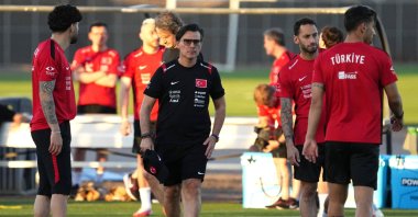 Türkiye's Hakan Çalhanoğlu (2nd R) with coach Vincenzo Montella during training at Arizona Athletic Grounds, Mesa, Arizona, U.S., June 22, 2026. (Reuters Photo)
