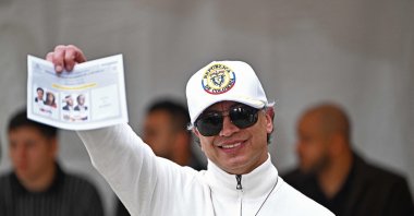 Colombia's President Gustavo Petro shows his ballot as he votes at a polling station during the presidential election runoff, Bogota, Colombia, June 21, 2026. (AFP Photo)