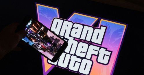 This illustration shows Rockstar Games’ Grand Theft Auto VI trailer played on a screen in front of the game title, Los Angeles, U.S., Dec. 4, 2023. (AFP Photo)