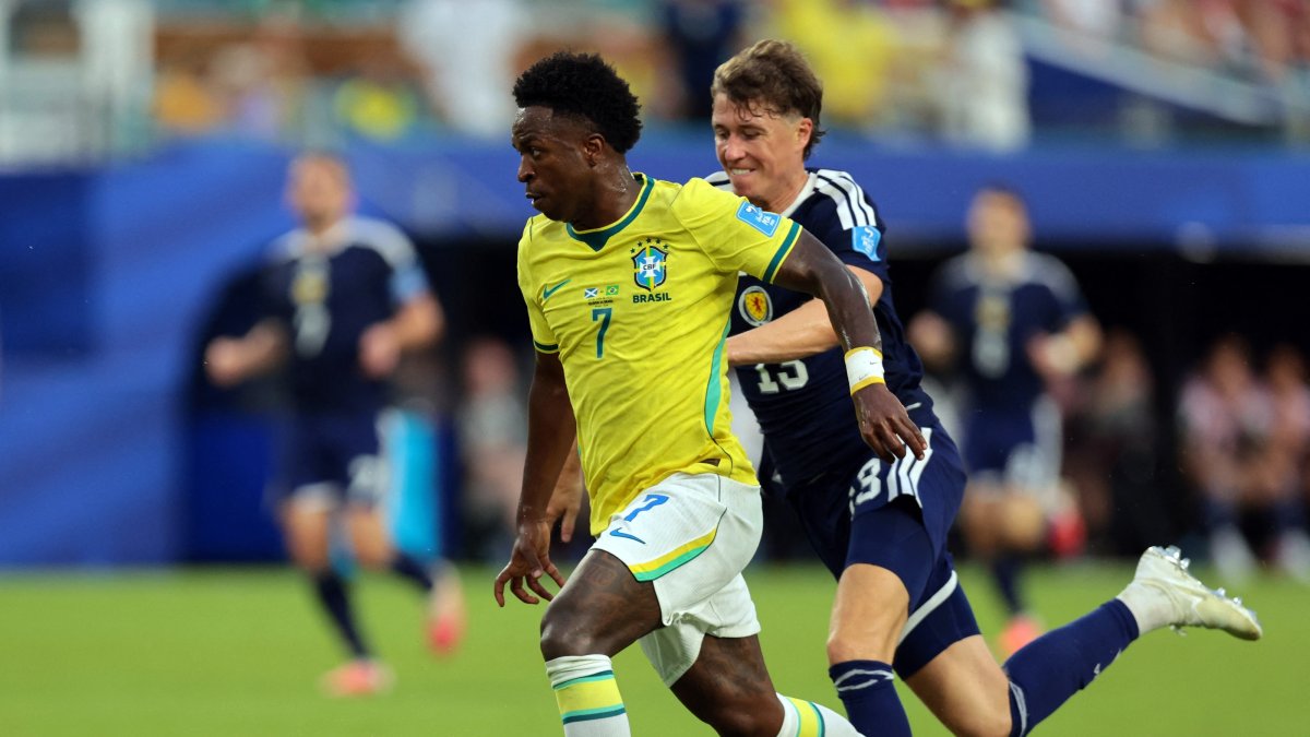 Brazil's Vinicius Junior in action with Scotland's Jack Hendry during the 2026 FIFA World Cup Group C match at Miami Stadium, Miami Gardens, U.S., June 24, 2026. (Reuters Photo)